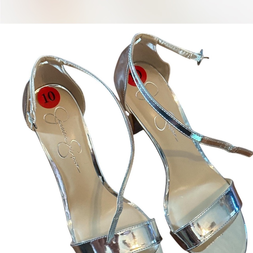 Jessica Simpson silver block heels size 10.
Basically new worn once